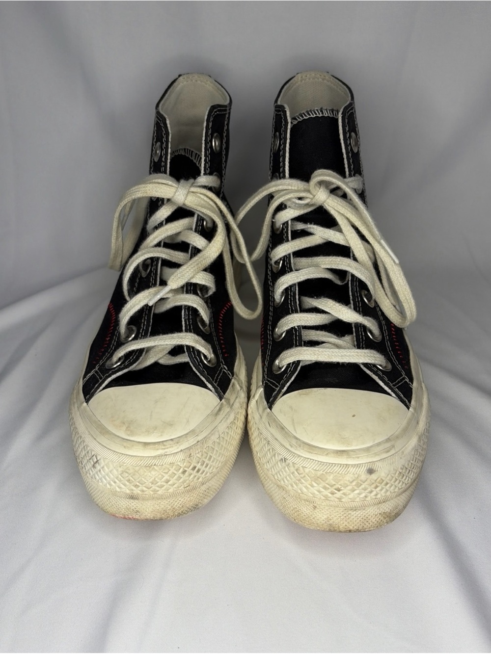 Converse Off-White High-Top Canvas Sneakers with Black Script
